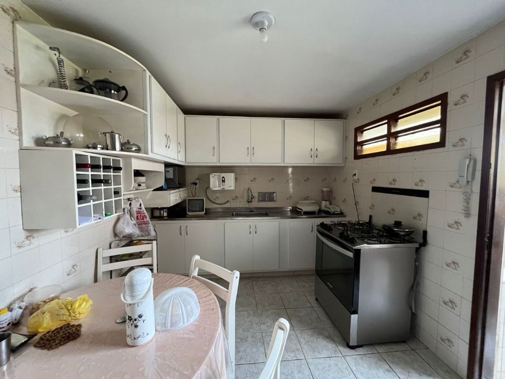 Casa com 3 dormitórios à venda por R$ 600.000,00 - Bancários -...