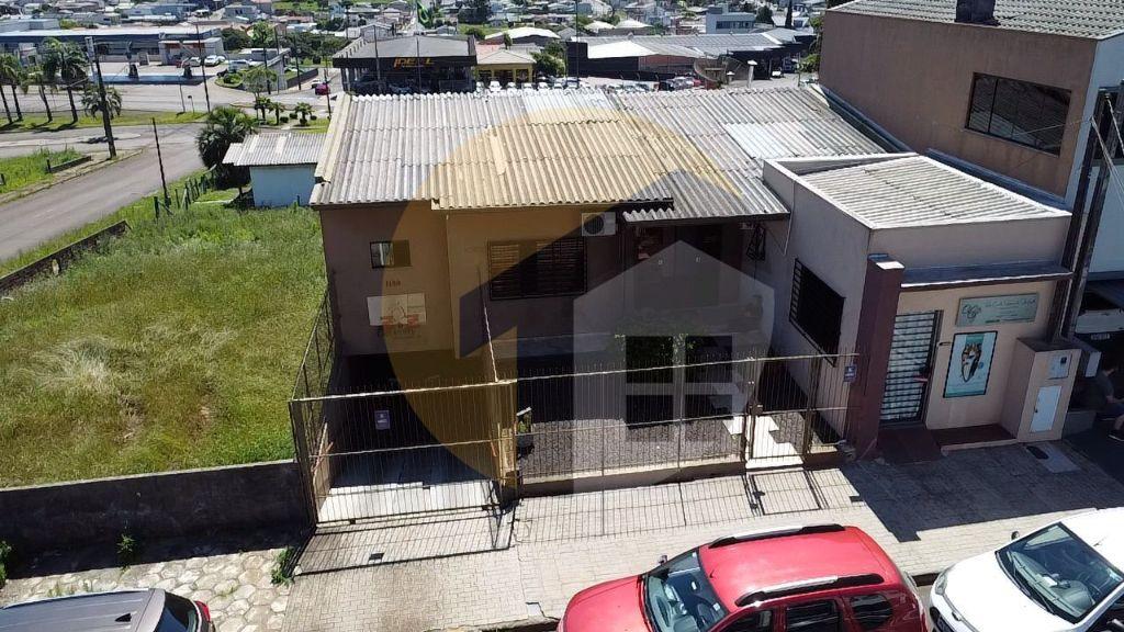 VENDE-SE CASA CONTENDO SALA COMERCIAL 