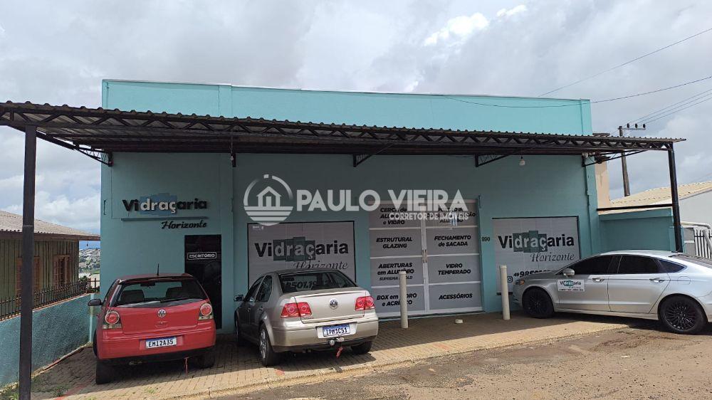 SALA COMERCIAL E CASA COM DOIS PAVIMENTOS