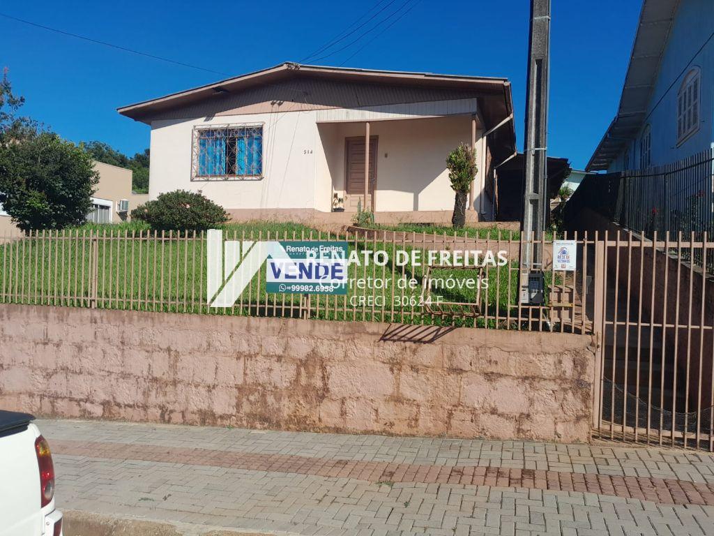 Terreno com casa em ótima localização 