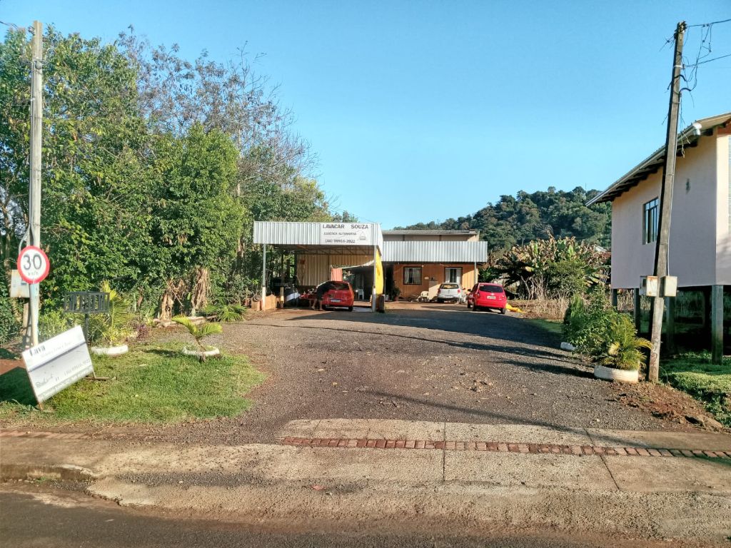Casa com Posto de Lavagem